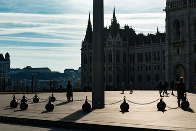 Tourists in front of building