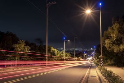 Light trails on road at night