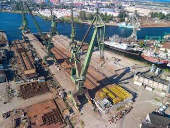 High angle view of boats moored at harbor