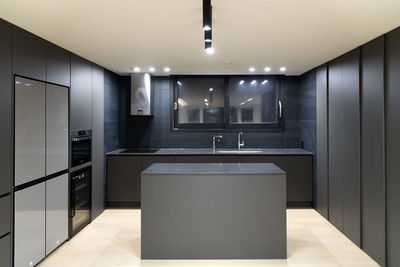 Interior of illuminated kitchen 