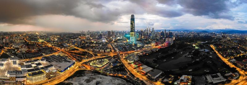 High angle view of city buildings against sky