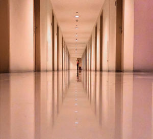 Man walking in corridor