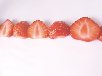 Close-up of fruits against white background