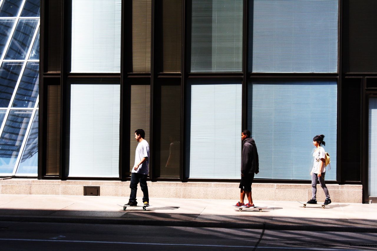 PEOPLE WALKING ON BUILDING