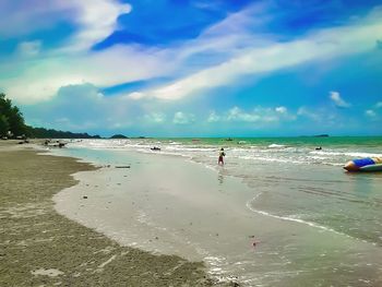 Scenic view of beach against sky