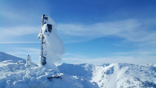 Snow covered mountain against sky