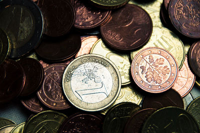 High angle view of coins on table