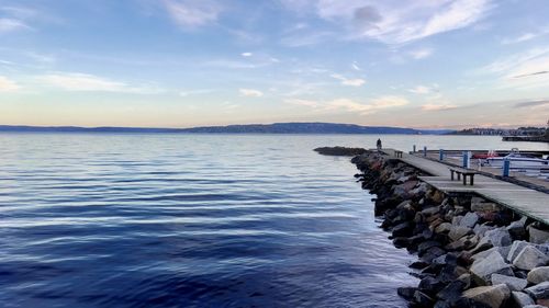 Scenic view of sea against sky during sunset