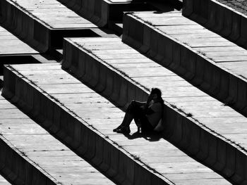 High angle view of men walking on staircase