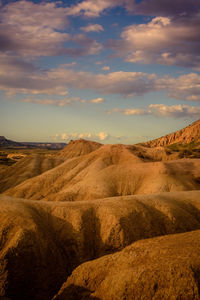 Scenic view of landscape against sky during sunset