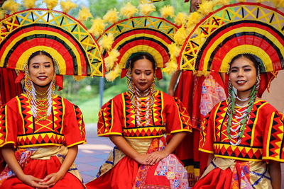 Portrait of a smiling young woman in traditional clothing