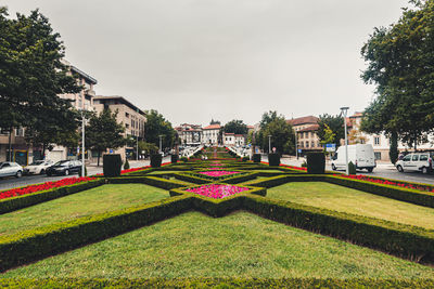 View of garden with buildings in background