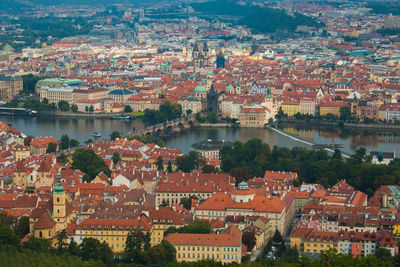 High angle view of river amidst buildings in city