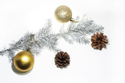 Close-up of christmas decoration against white background