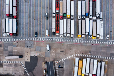 Aerial view of harbor and trucks parked along side each other in dover, uk.