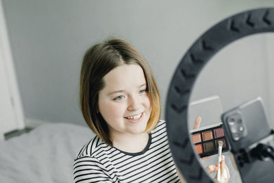 Make up influencer vlogging at home