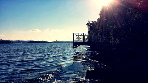 Sun shining over sea
