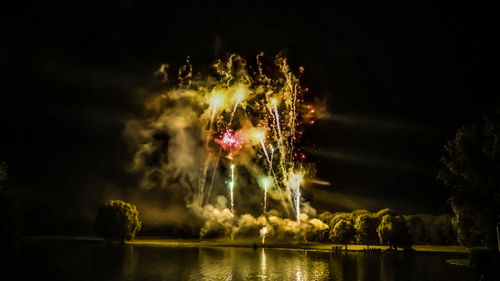 Firework display at night