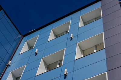 Low angle view of modern building against sky