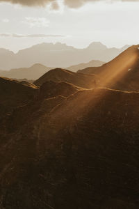 Scenic view of landscape against sky during sunset