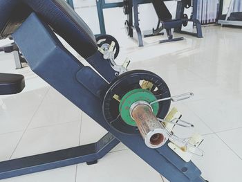 High angle view of wheel on tiled floor