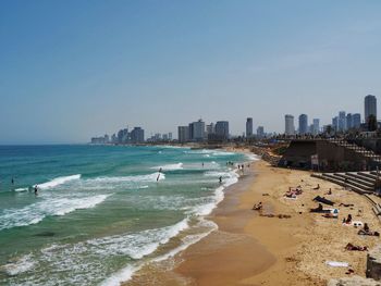 Scenic view of beach against clear sky