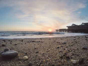 Scenic view of beach at sunset