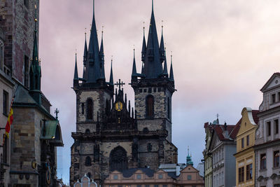 Low angle view of buildings against sky in city