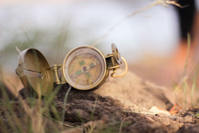 Close-up of clock on field