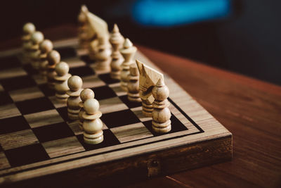 Close-up of chess pieces on board