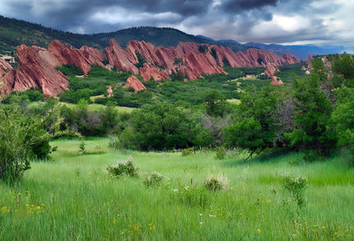 Striking red sandstone rock formations of roxborough state park in colorado on a stormy afternoon.