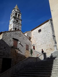 Low angle view of steps against sky