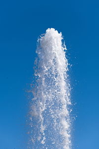 Low angle view of water against blue sky