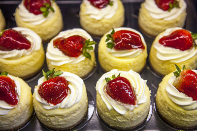 High angle view of strawberries on table