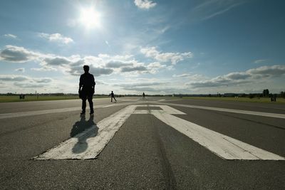 Road against cloudy sky