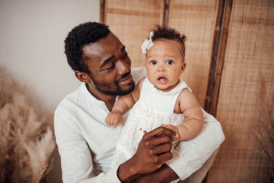 Portrait of father with son