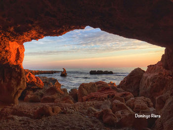 Scenic view of sea at sunset