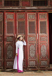 Beautiful woman exploring the imperial palace in hue / vietnam