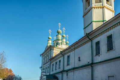 Low angle view of building against blue sky
