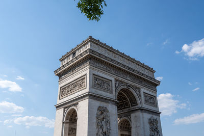 Arc de triomphe viewed from the place charles de gaulle. famous landmark in paris, france