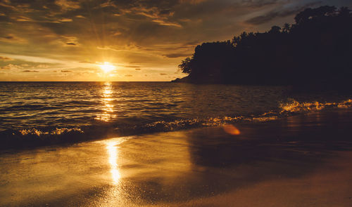 Scenic view of sea against sky during sunset