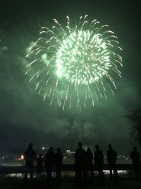 Firework display at night