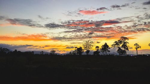 Scenic view of silhouette landscape against sky during sunset