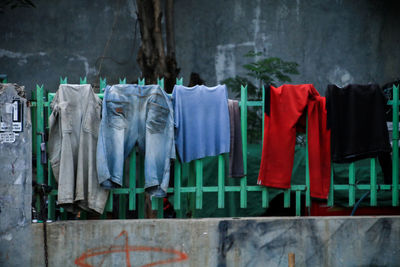 Close-up of clothes drying against building