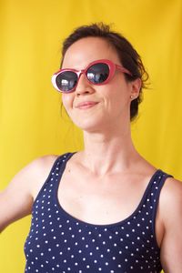 Portrait of woman wearing sunglasses