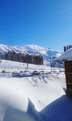 Scenic view of snow covered mountains