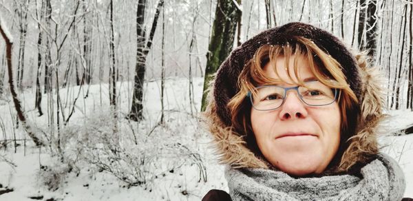 Portrait of woman in snow