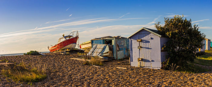 House on beach against sky