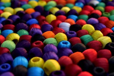 Full frame shot of multi colored balls of wool