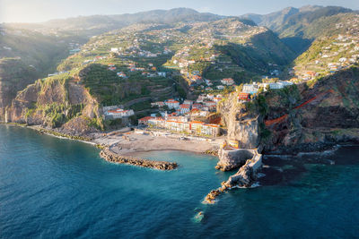 High angle view of sea and mountains